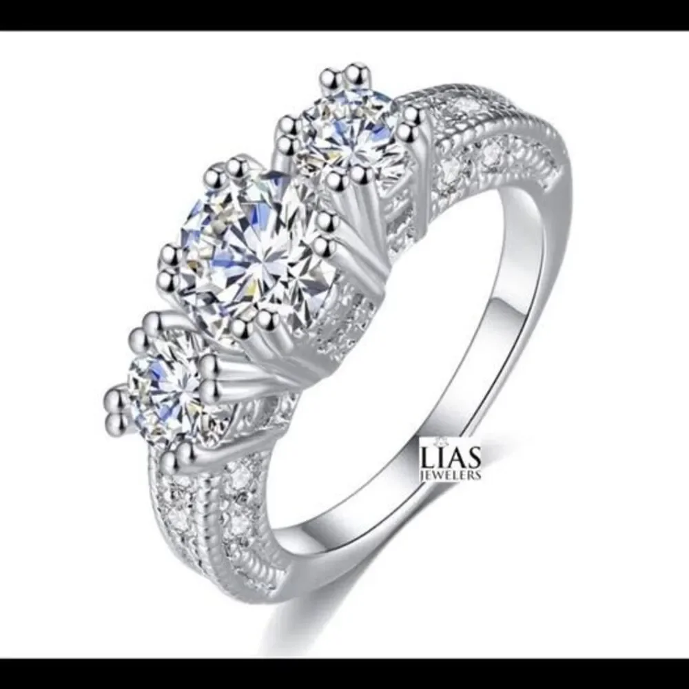 New 18k white gold engagement ring